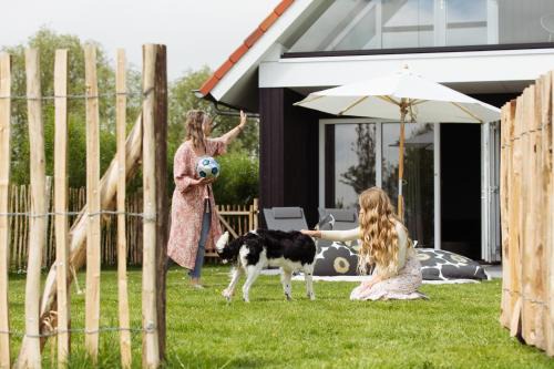 Oostrum Casa | Vakantiehuis aan het water met omheinde tuin