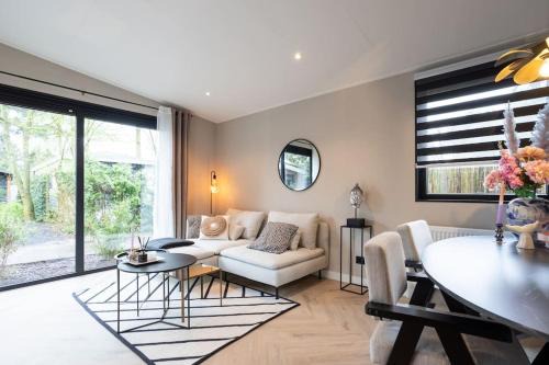 Krachtighuizen Chalet De Esquí | Veluwe Boutique Lodge