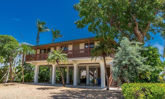 Venetian Shores Casa | Venetian Shores Retreat with Boat Lift, Tiki Hut & Hot Tub