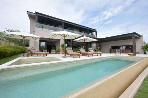 Punta de Mita Casa | Villa Amada at Porta Fortuna Ocean Views Staff Golf Cart by Mita Residential