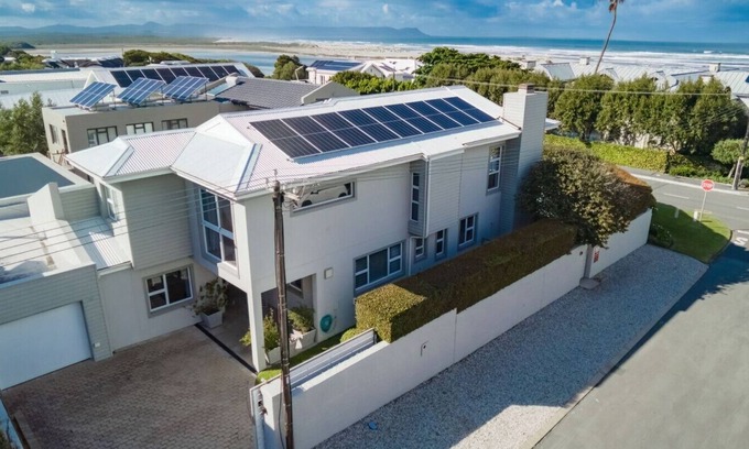 Voelklip Apartamento | Villa Armonia | Grotto beach | Large sun deck with pool