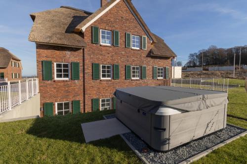 Lohme Casa | Villa BalticBliss auf Rügen - direkt am Golplatz mit Sauna und Jacuzzi