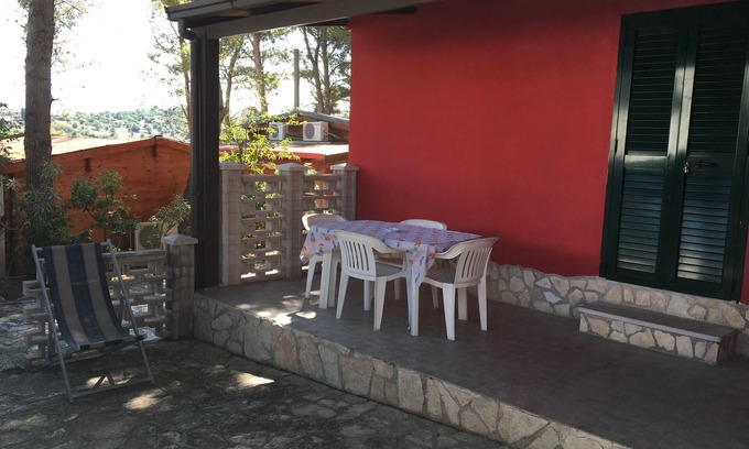 Defensola Apartamento | VILLA BILOCALE ORCHIDEA B 1 dormitorio, sala de estar con 2 camas y cocineta
