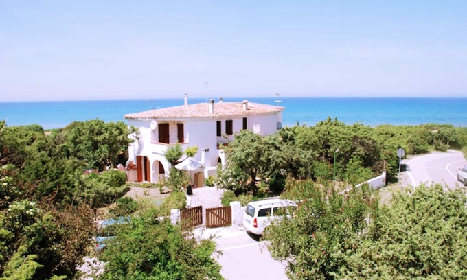 Platamona Villa | Villa Eden Beach, para 10 personas, a 50 metros de la playa, con jardín