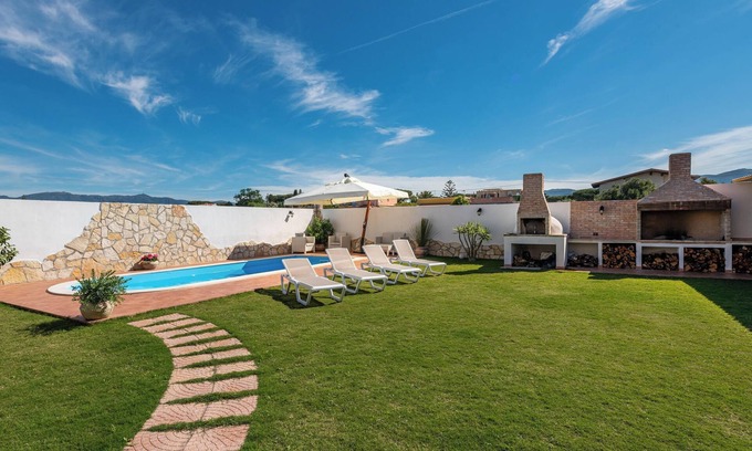 Quartu Sant'Elena Villa | Villa "Gle" con piscina, jardín y aire acondicionado