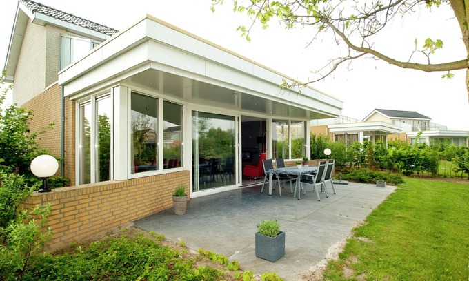 Heel Casa | Villa en Maaspark con Sauna y Vista al Lago