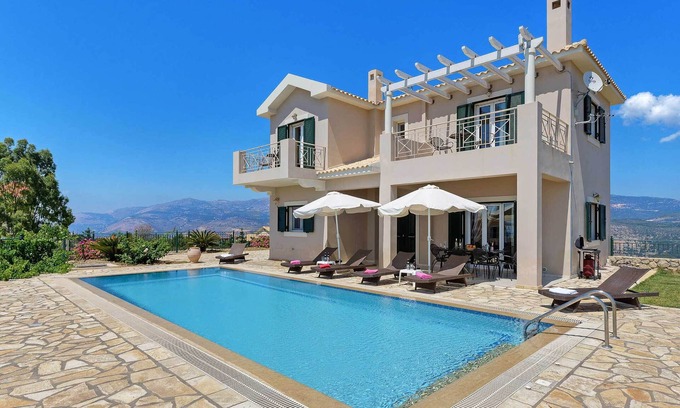 Lassi Villa | Villa Kalithea - Esta villa incluye una terraza abierta con vistas panorámicas al mar.