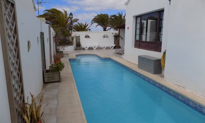 Matagorda Villa | Villa Katie es una fantástica villa privada de 3 dormitorios con piscina y está al lado de la playa