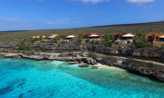 Kralendijk Villa | Villa Kokopelli - Villa de vacaciones con piscina privada en estilo mexicano y vistas al mar