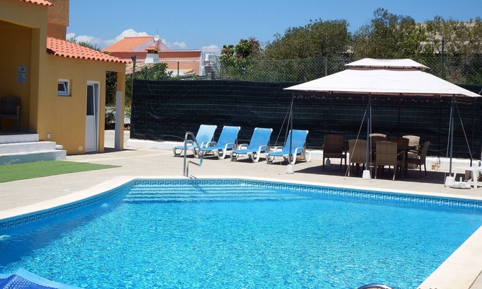 Barros Villa | Villa Lara, casa espaciosa de 5 dormitorios con piscina climatizada, wifi gratuito, estacionamiento seguro