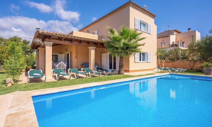 Portopetro Casa | "Villa Manuela" con piscina infinita, jardín y Wi-Fi