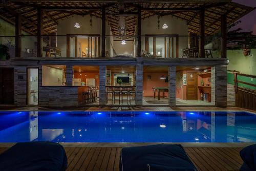 Arraial d'Ajuda Casa | Villa Maritaca Condomínio de 4 Casas de Locação por Temporada de Alto Padrão com SPA