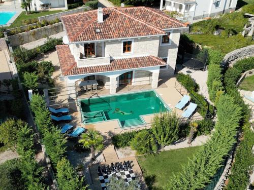 Kornic Villa | Villa NOAH - 4 bedrooms, 4 bathrooms, heated inside pool, jacuzzi, sauna, gym