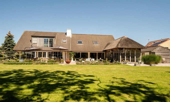 De Haan Casa | Villa Rosetree with sauna and pool table by Interhome