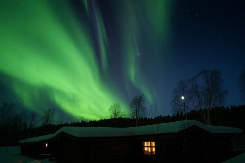 Inari Villa | Villa Tolonen a beautiful log villa by the Ivalo River