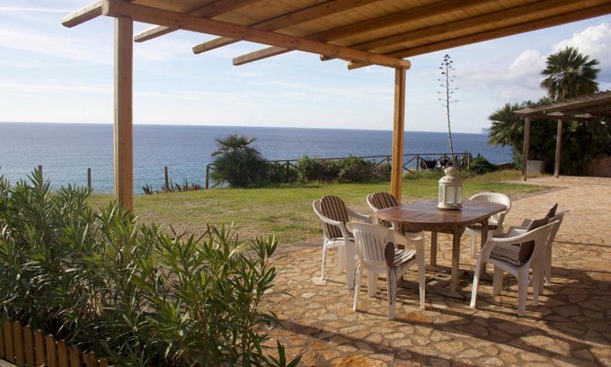 Alghero Apartamento | Villa Wanda - Seafront apartment on Cala Burantino with private cove