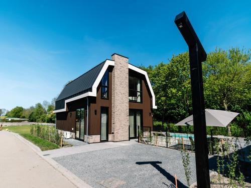 Waarland Casa | Villa Watergloed a stylish, brand new holiday home for 16 people