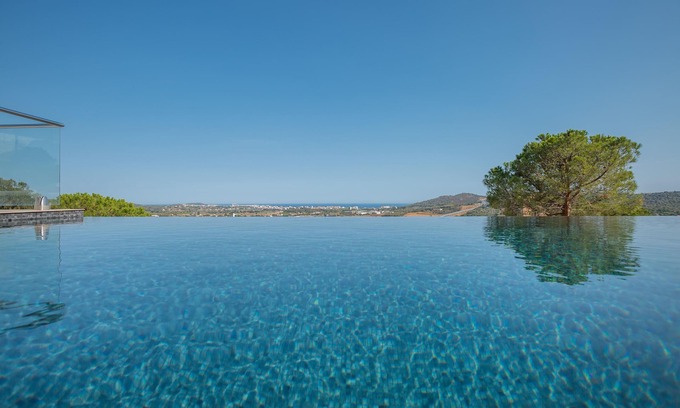 Calonge Villa | Villa con vistas al mar. Piscina desbordante.