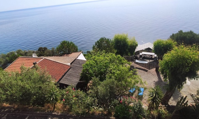Milazzo Cabaña | Villa Cueva de Oro en Cabo Milazzo, con playa contigua