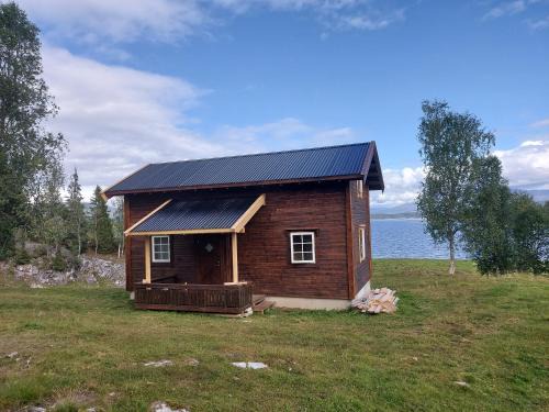 Hattfjelldal Casa | Villmarksgård, hytte ved vannet