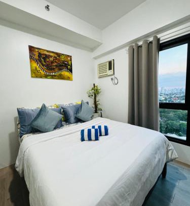 Phil-Am Apartamento | Vinia Infinity Studio 1 Near Malls with WiFi and Netflix