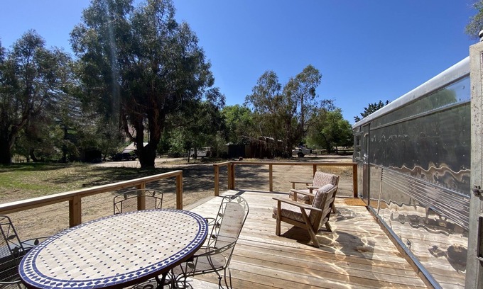 Kernville Casa | Vintage wood paneled travel trailer on Kernville Ranch with horses and hot tub