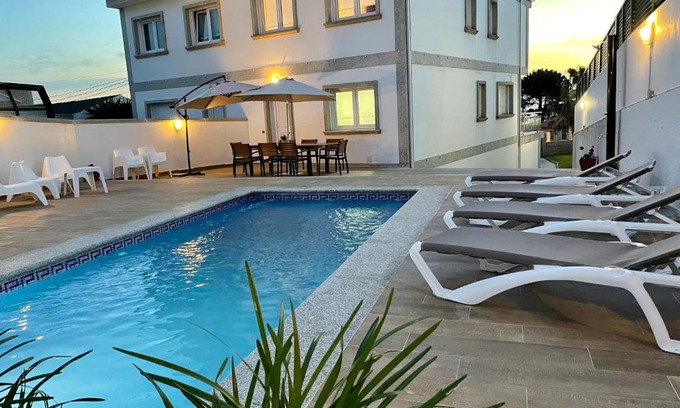 Aios Casa | Vivienda adosada con piscina cerca de la playa