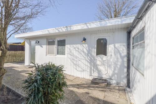 Westerland Chalet De Esquí | Wad'n Huis - Unieke chalet aan zee