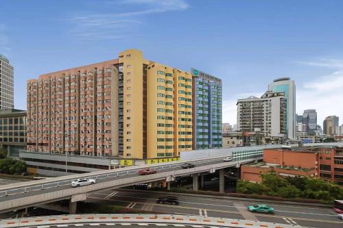 Yuexiu Hotel | WAIFIDEN Hotel -Former Tokai Hotel - Xiaobei Metro Station - During the Canton Fair, there will be shuttle buses for transportation back and forth