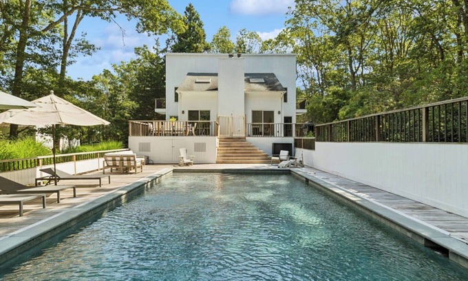 East Hampton Casa | Wainscott retreat w resort-style indoor-outdoor living, pool, total.