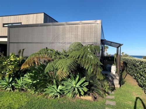 Wainui Apartamento | Wainui Beach studio - 2 minutes walk to beach