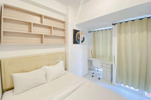 Java Apartamento | Warm and Simply Look Studio Tokyo Riverside PIK 2 Apartment By Travelio