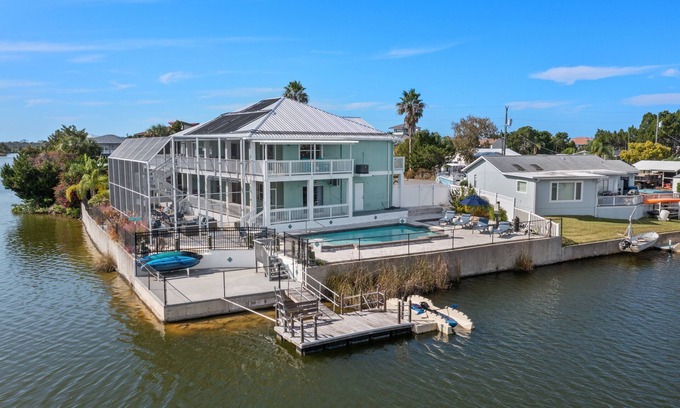Hernando Beach Casa | Water Front/ Free Heated Salt Water Pool/Game Room/Amenities Galore