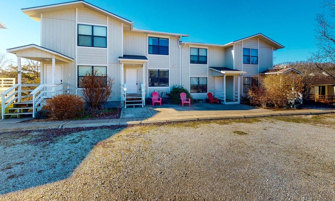 Holiday Island Casa | Water view townhouse with a washer/dryer, central AC, yard & grill