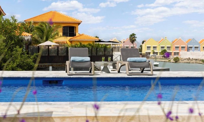 Tera Kora Casa | Water villa with terrace, SUP boards, barbecue, and access to a shared swimming pool.