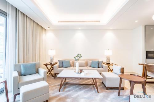 Sharm Apartamento | Waterfront 2BR in The Address Fujairah Residences Block C, Sharm by Deluxe Holiday Homes