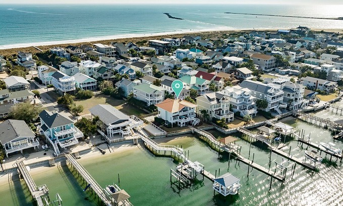 South End Casa | Waterfront 5 BR home w/ incredible views, dock, boat slips, & elevator!