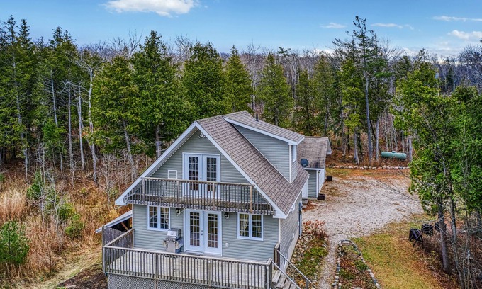 Manitoulin District Casa | Waterfront, chalet style home; minutes walk to the beach