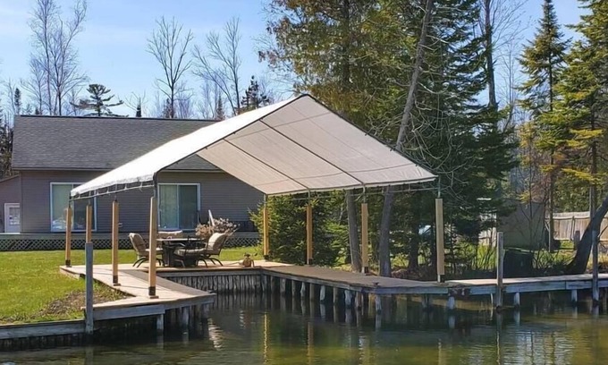 Alanson Casa | Waterfront Cottage with Covered Boat Slip