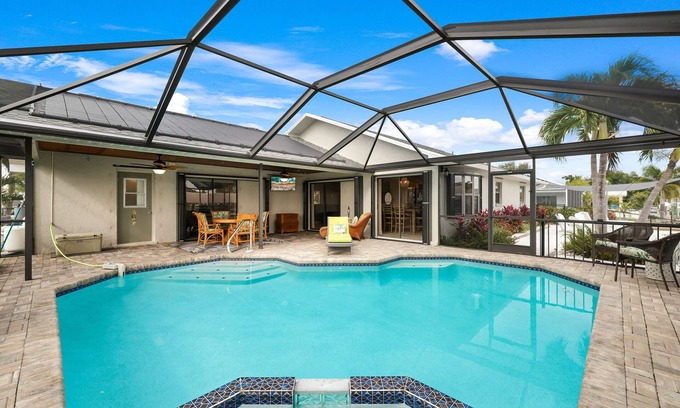 Lochmoor Waterway Estates Casa | Waterfront Heated Pool Home Retreat, Direct Gulf Access, Special Deals