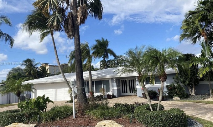 Garden Isles Casa | Waterfront, heated Pool enclosed, our home is completely renovated, very private