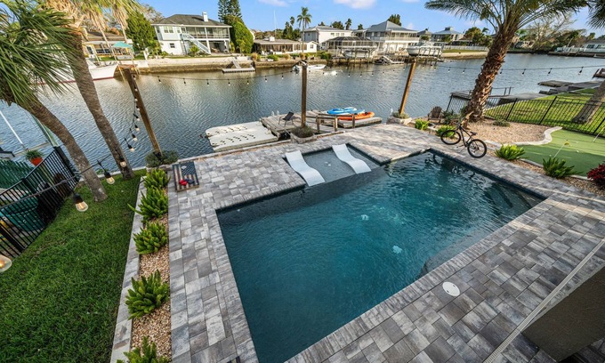 Spring Hill Casa | Waterfront home w/ direct gulf access + pool + hot tub + activites!