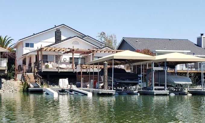 Discovery Bay Casa | Waterfront Home with large boat dock & boat rental and other water toys