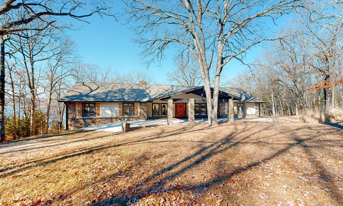 Rogers Casa | Waterfront home with Ping-Pong, washer/dryer & fireplace