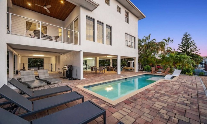 South Island Casa | Waterfront Luxury | Walk to Beach | Heated Pool
