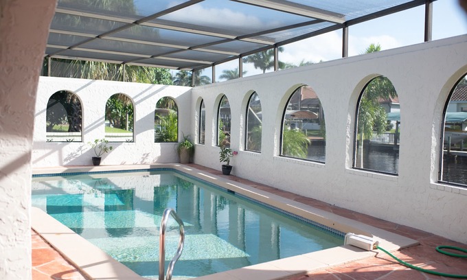 Yacht Club Villa | Waterfront luxury 4 bed 4 bath with large heated pool & dock