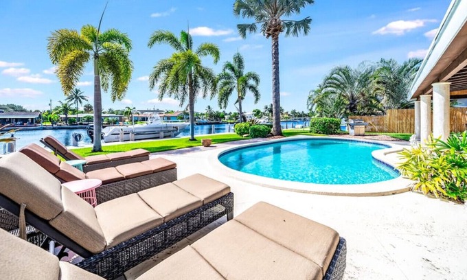 Cypress Lakes Casa | WATERFRONT PARADISE + HEATED POOL! MILE TO BEACH!