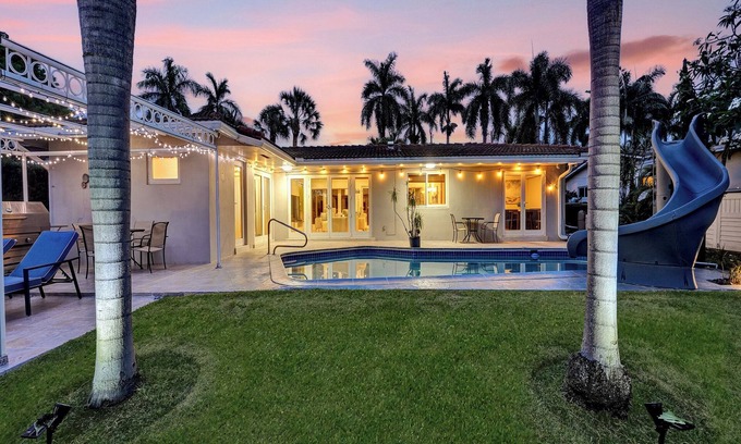 Coral Ridge Isles Casa | Waterfront Serenity. Pool & BBQ. Koi Pond