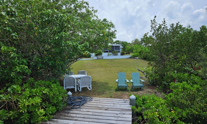 Green Turtle Cay Casa | Waterfront on White Sound, muelle privado, playa y piscina,