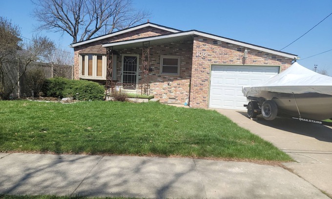 Wyandotte Casa | Waterfront with Boat Dock on Detroit River Channel. Fish from the backyard